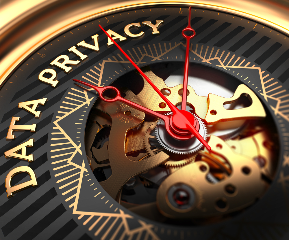 Data Privacy on Black-Golden Watch Face with Closeup View of Watch Mechanism. Data Privacy on Black-Golden Watch Face with Closeup View of Watch Mechanism.